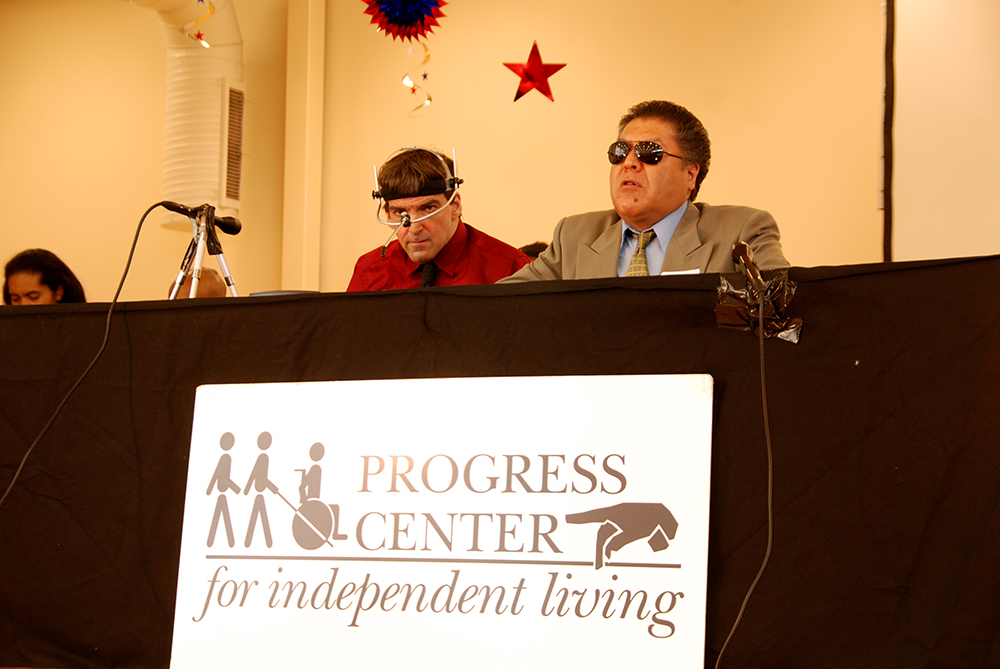 Progress Center for Independent Living - Two people in a meeting
