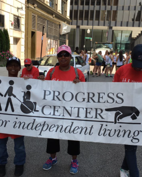 Members of the Progress Center independent living at a march in support of the foundation